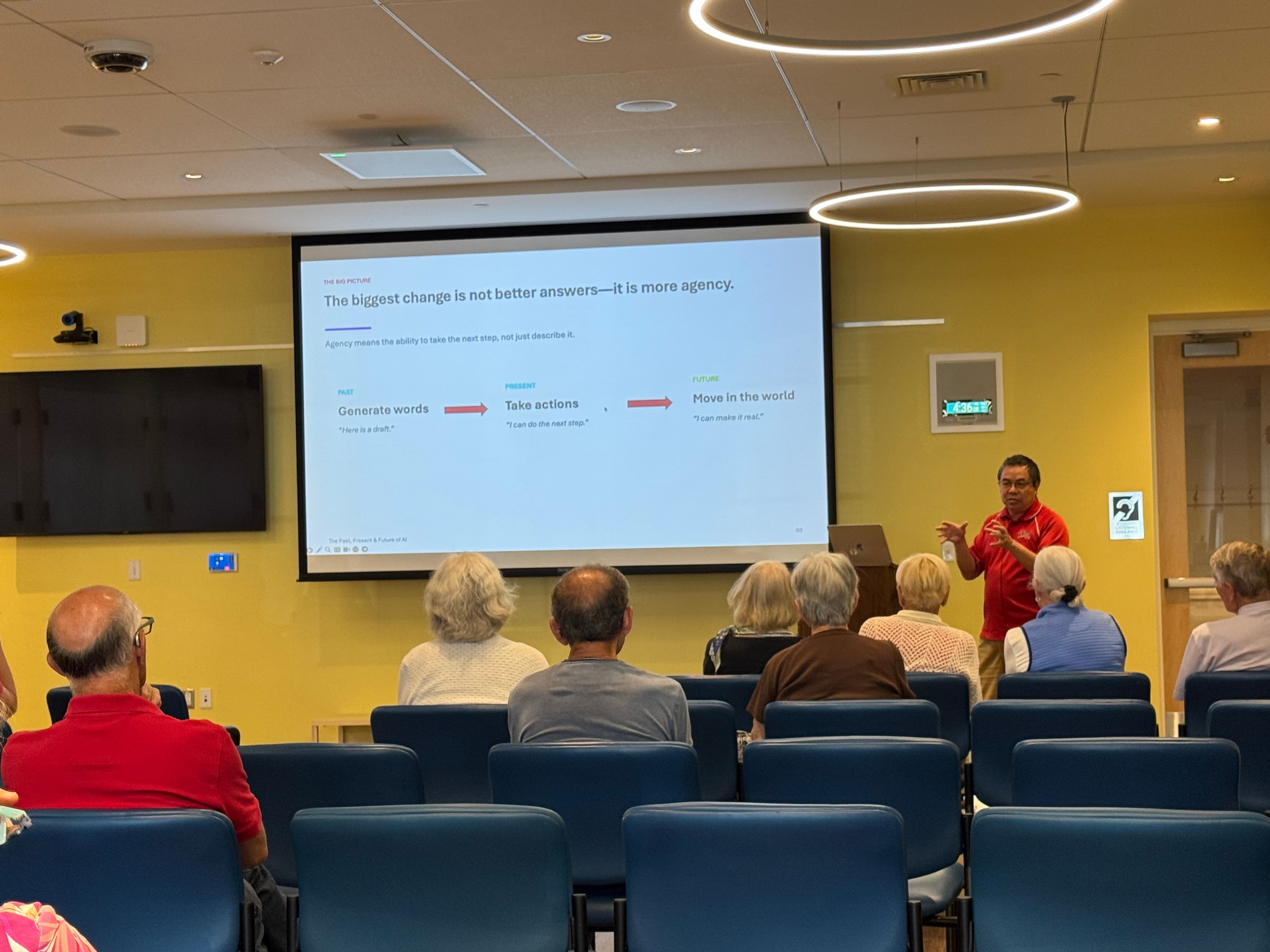 Max Li presenting about AI agency to an audience at the Andover Senior Center